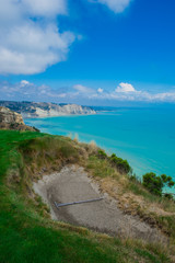 Limestone cliffs near Cape Kidnappers Golf course, with views of South Pacific Ocean, New Zealand