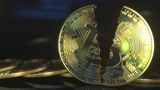 Cracked bitcoin token. Cryptocurrency crisis concept