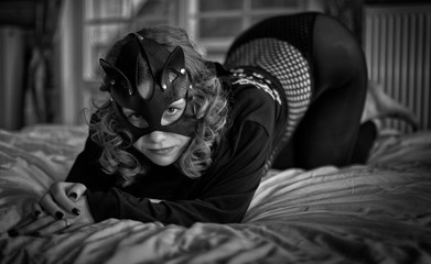 Seductive cat-woman in sexy costume