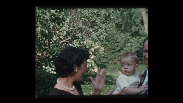 1953 Proud new parents and Grandmother show off baby boy