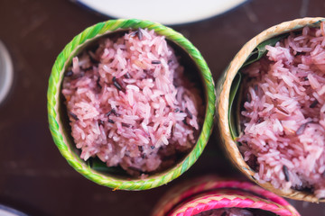 Dark sticky rice inside bamboo container