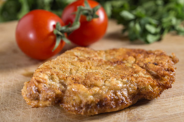 Fried breaded schnitzel (could be either veal, pork or chicken schnitzel)