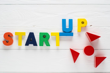 Startup word made from colored wooden letters