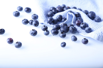 Fresh blueberry lying on the white table during the day