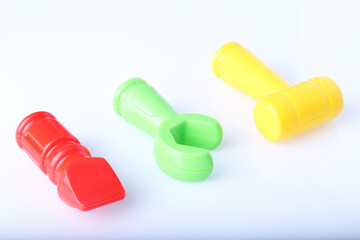 A set of tools. Toy tools plastic color on a white background