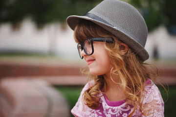 little hipster girl with big glasses