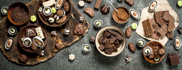 Chocolate sweets with cocoa powder. - obrazy, fototapety, plakaty