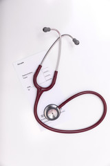 Prescription form on a table with stethoscope
