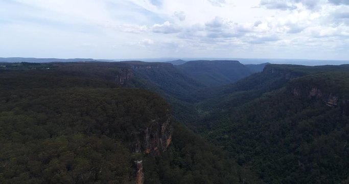 Southern highlands sandstone mountain plato around Morton national park and Fitzroy falls in NSW, Australia. Aerial panning along Yurranga creek.
