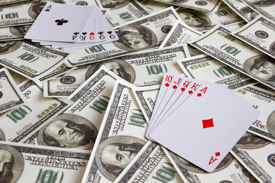 Playing cards lie on dollar bills. Gambling card games. Winning. fortune. luck. luck. casino.