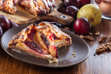 Portion of galette with pears and plums