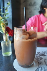Ice cocoa drink on cafe table