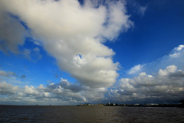 Naklejka na ściany i meble daytime clouds at the harbor