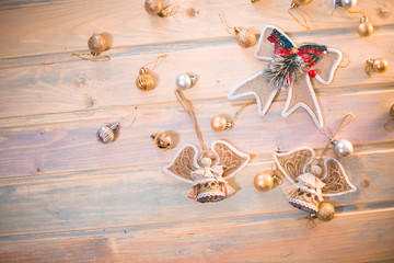 New Year's background. Angels on wooden old boards.