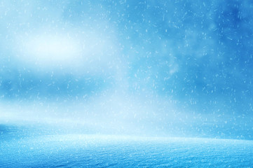 Obraz premium Winter christmas background with shiny snow and blizzard