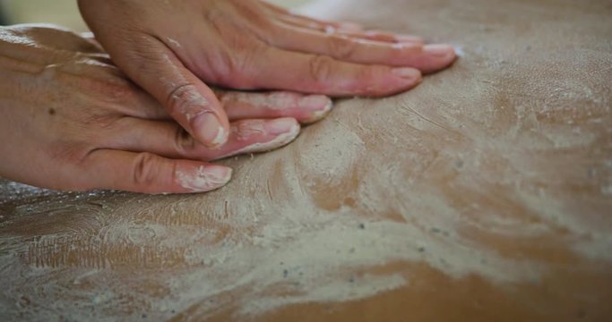 Woman relaxing reciving body scrub at the spa