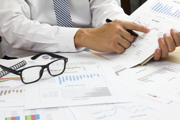 Businessman Summary report and financial analyzing product market plan