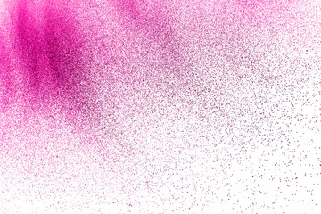 abstract pink dust explosion on  white background. abstract pink powder splattered on white  background, Freeze motion of pink powder exploding.