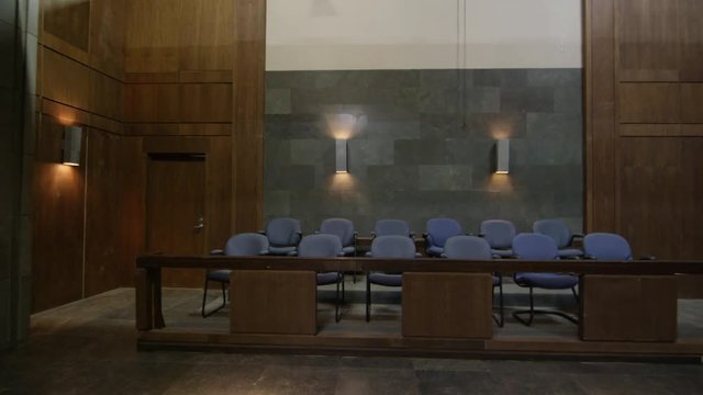 Empty seats of the jury in a modern court room