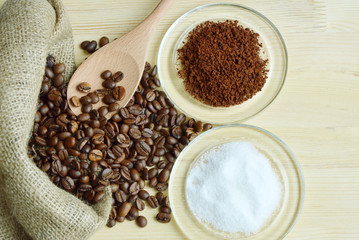 Coffee bean, Instant Coffee and sugar in sack and glass plate