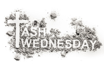 Ash Wednesday word written in ash, sand or dust