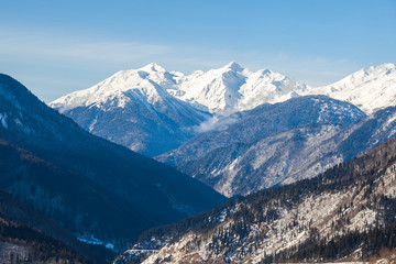 Fototapeta na wymiar Panoramic view on snow winter mountains. Caucasus Mountains. Svaneti region of Georgia