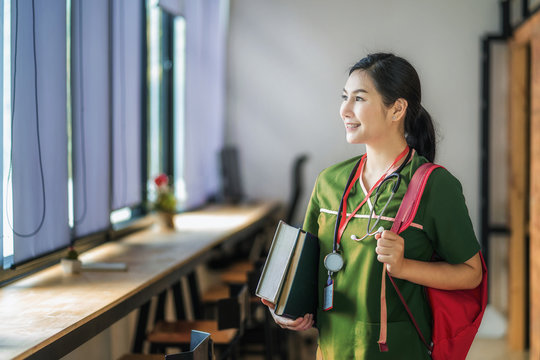 Young Asian Woman Is Going To Nursing School	