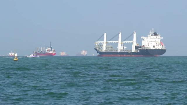 Cargo ships floating on the sea.