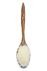 grated Parmesan cheese in wooden spoon on white background