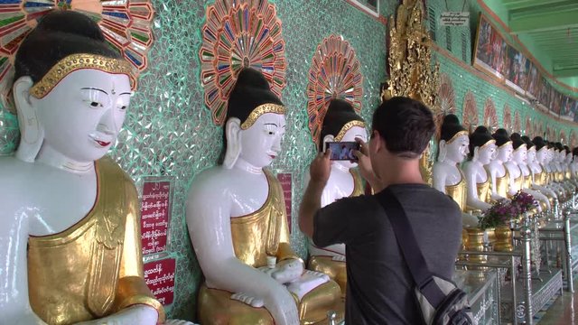 Male Tourist Visits Buddhist Temple