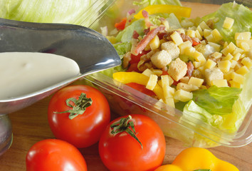 salads in plastic boxes at the supermarket