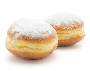 Traditional doughnuts (Sufganiyah) isolated on white background two fresh baked with powered sugar...