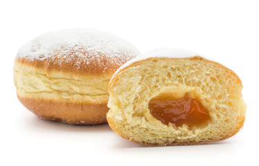 Traditional doughnut (Sufganiyah) and one half with apricot jam isolated on white background fresh baked with powered sugar and without hole.