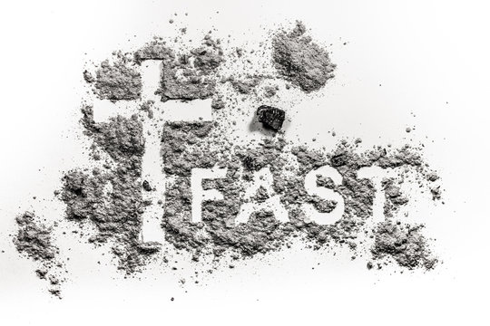 Word fast written in ash, dust or sand