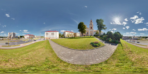 Full 360 by 180 degrees seamless equirectangular spherical panorama of the city in sunny day with...