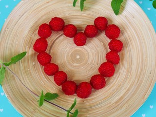 Raspberries healthy food love plate © Agnieszka