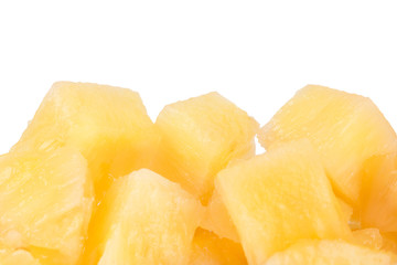 Pieces of fresh pineapple on a white background