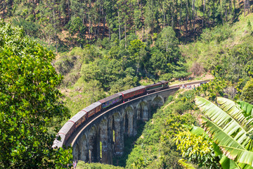 Passenger train between Demodara and Ella on the Nine Arches Bridge in the Uva province of Sri...