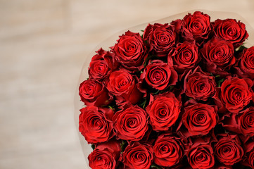 nice romantic bouquet of roses red color close up on white background