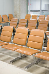 A row of empty seat vintage style in the airport