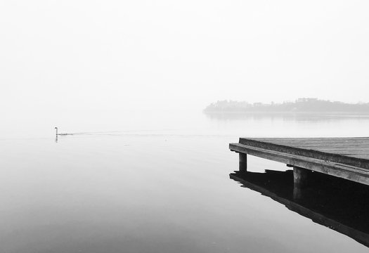 varese lake in a foggy day