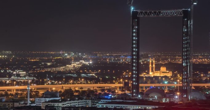 DUBAI, UAE – MARCH 2016 : Timelapse of Jumeirah Mosque from a distance at night with cityscape in view