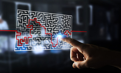 Businesswoman searching solution of a complicated maze
