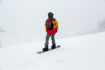 Fototapeta na wymiar Snowboarding on the slope.
