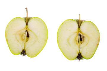 Halves of a fresh green sliced apple