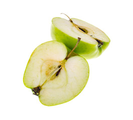 Halves of a fresh green sliced apple