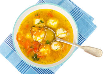 Soup with carrot, onion, paprika and meatballs