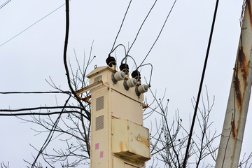 Chaos of cables and wires on electric pole, Messy wires attached to electrics pole in Bangkok,...