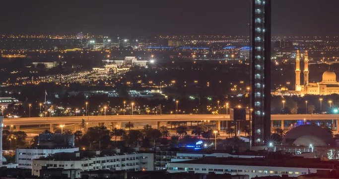 DUBAI, UAE – MARCH 2016 : Timelapse of Jumeirah Mosque from a distance at night with cityscape in view