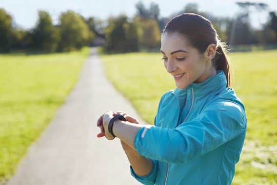 Young Woman Wearing Sports Watch